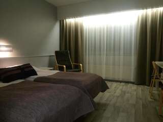 Отель Hotelli Kivitippu Лаппаярви Стандартный двухместный номер с 1 кроватью или 2 отдельными кроватями-12